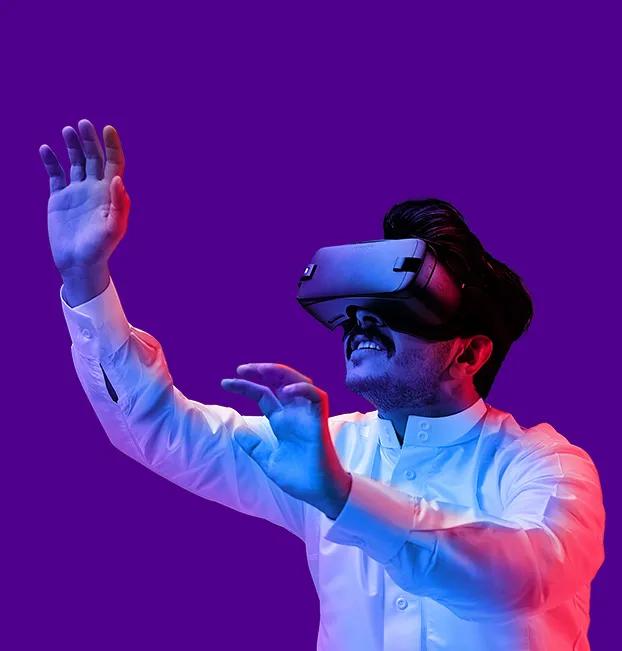 stc Bahrain's Technology and innovation, opens a lot of collaboration within the Gulf. A man with a VR mobile machine.